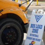 Loading sign next to bus