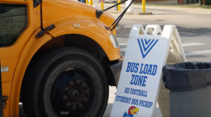 Loading sign next to bus