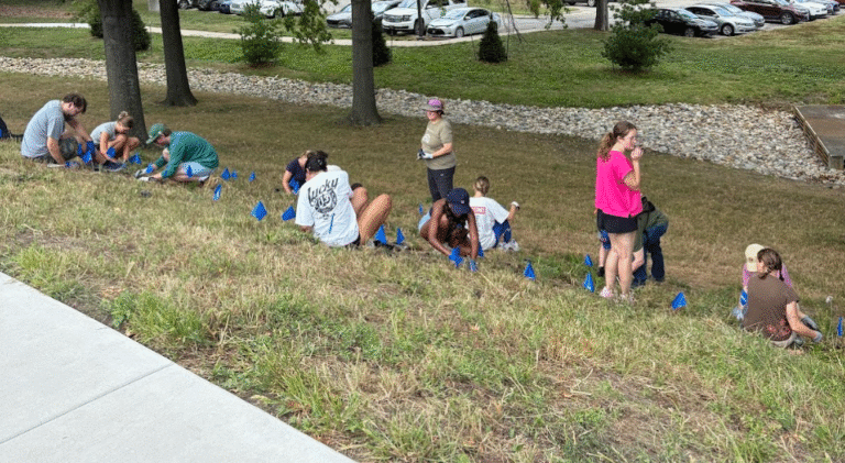KU Students Beautify Potter Lake Amid Ongoing Restoration Efforts