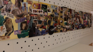 A row of collages by Tsutomu hangs in the Spencer Museum